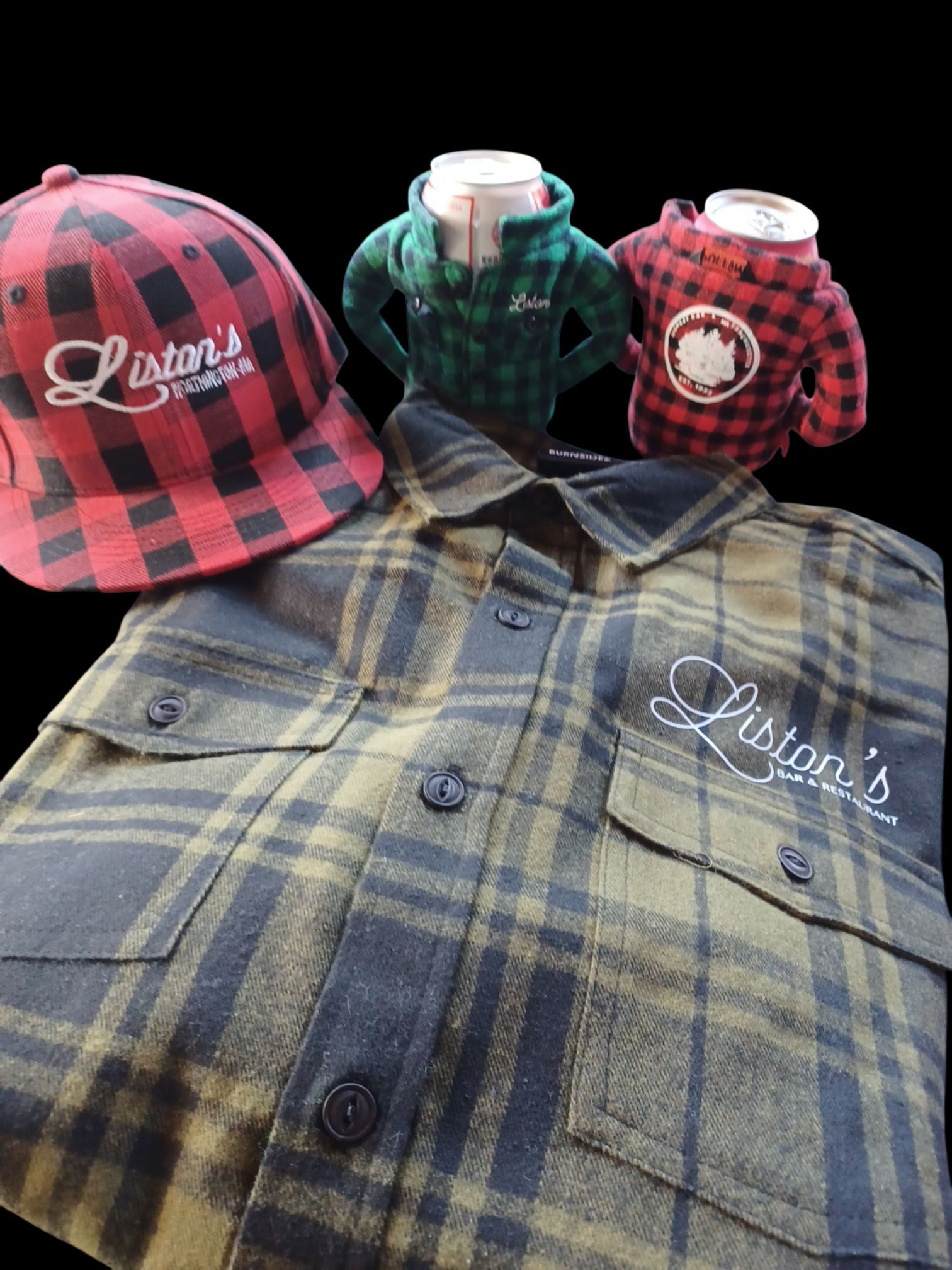 A red plaid baseball cap, a green plaid shirt, and two mini flannel koozies featuring the Liston's brand logo.