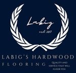 The logo for Labig 's Hardwood Flooring quality and service that will floor you