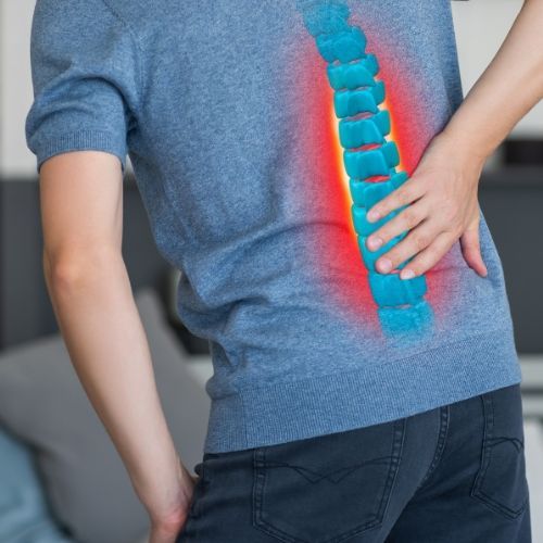 man with pain in mid back