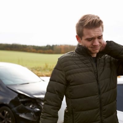 man with whiplash from car accident
