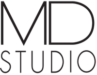 Logo di MD Studio in caratteri minimalisti neri su sfondo bianco.