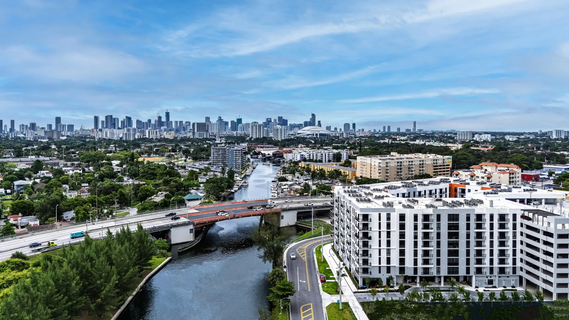 Beautiful aerial view of Tides at River Rapids with picturesque cityscape views and waterfront access, featuring modern architecture and vibrant surroundings.