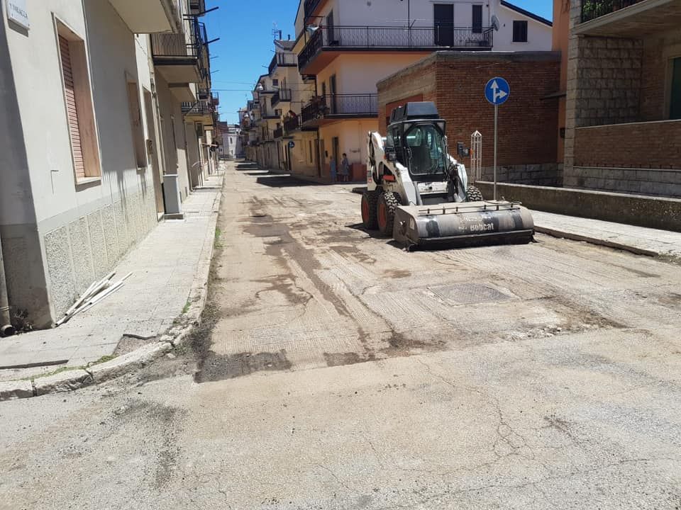rifacimento strada con buche