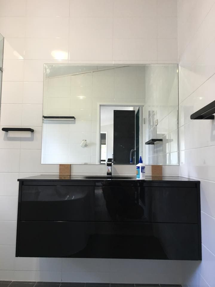 Person in Orange Work Jacket — Langley Plumbing in Mareeba, QLD