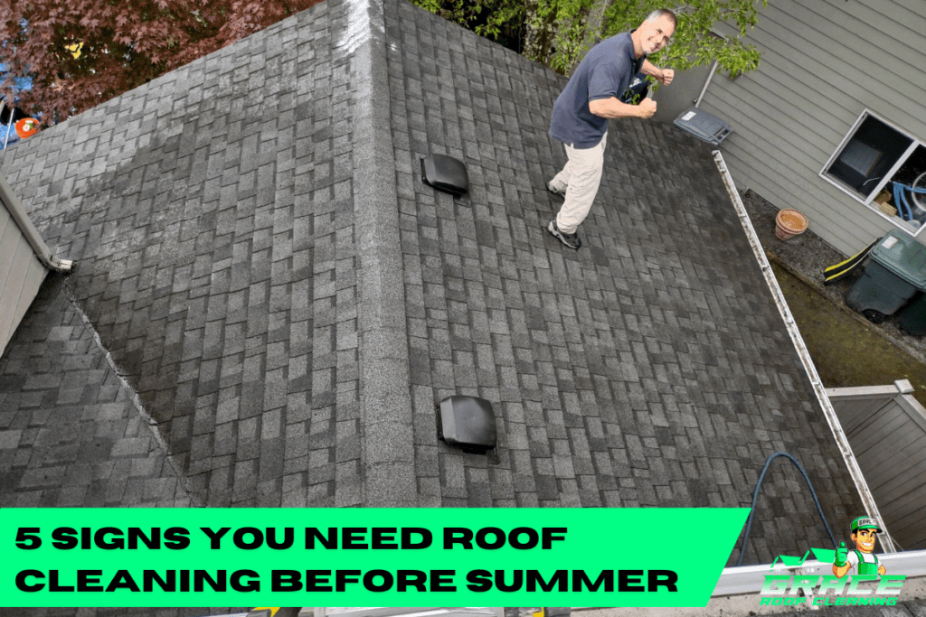 Roof inspection on a gray shingle roof; worker near the ridge with “5 signs you need roof cleaning before summer” text.