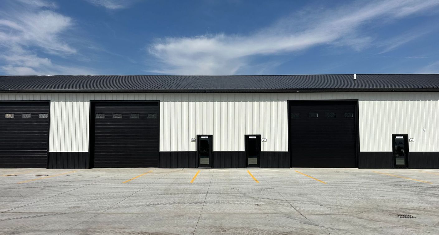 exterior of contractor shops and business suites for lease - paved lots