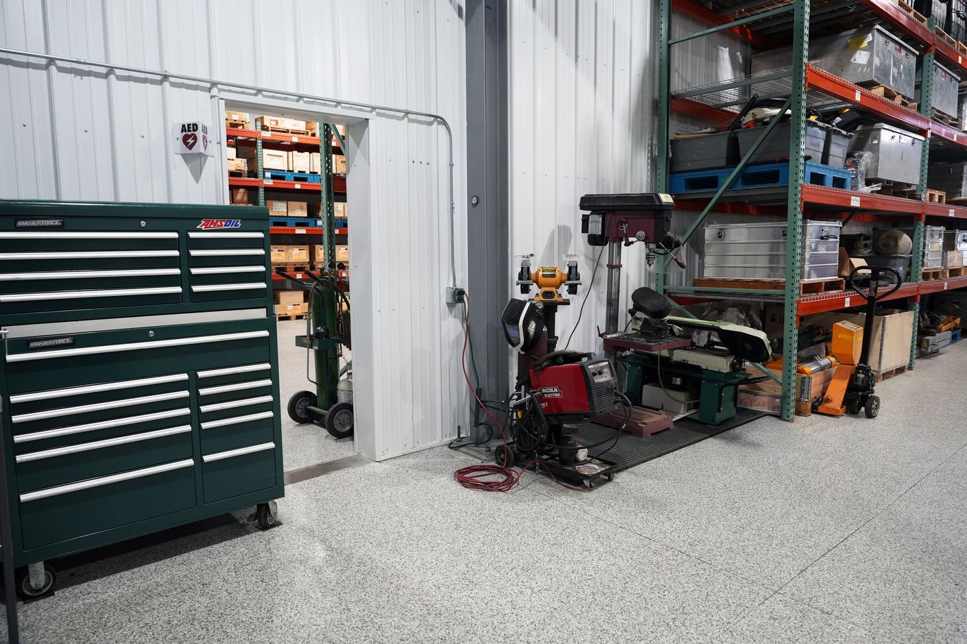 contractor shops and business suites for lease in use - tools and storage shelves