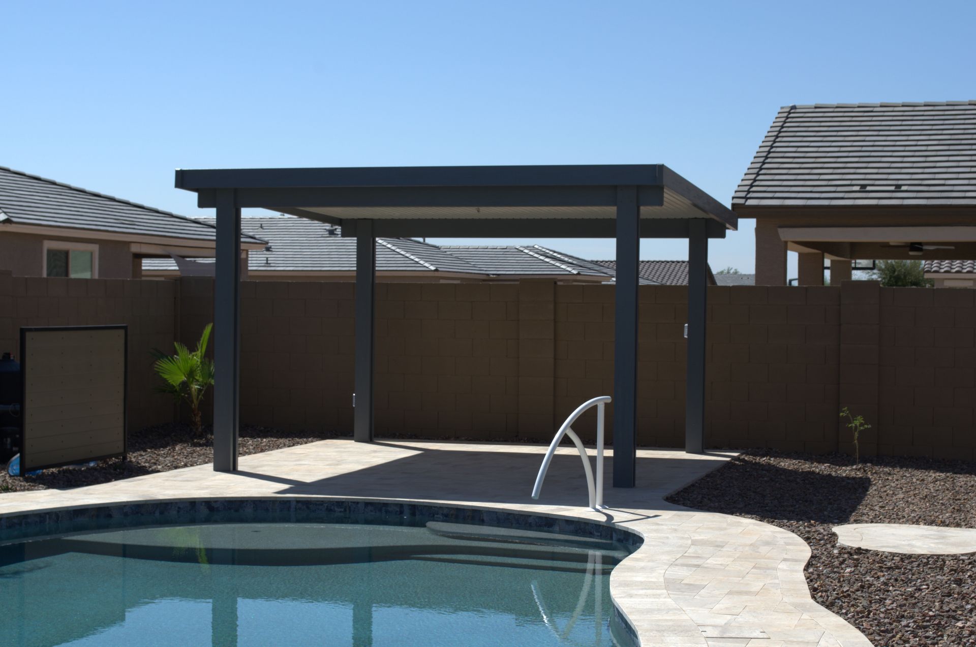 Craftsmanship from patio builders showcased in a Buckeye home's outdoor area.