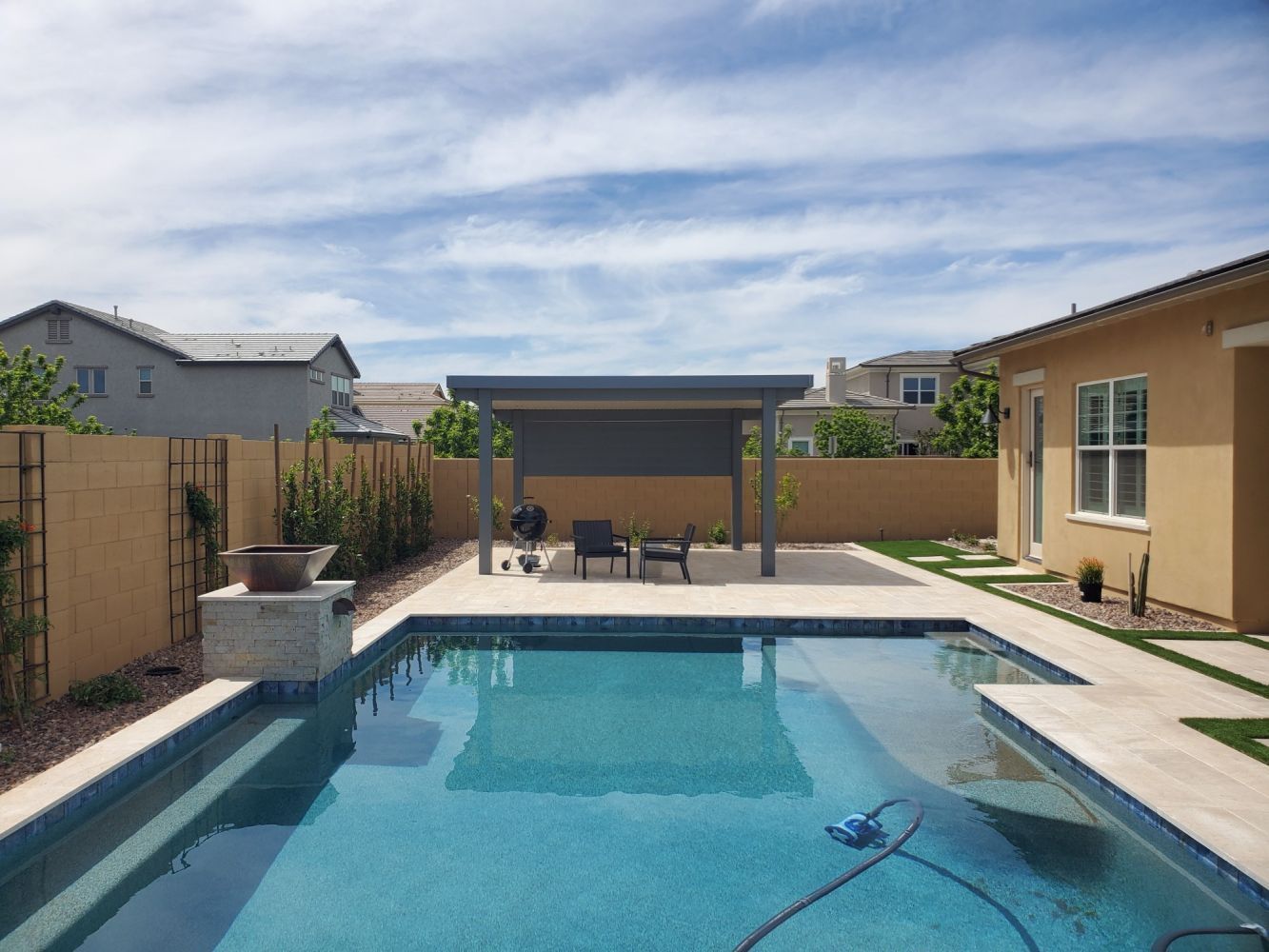Glendale outdoor space upgraded with a Solid Style Flat Pan Cover, enhancing family gatherings.