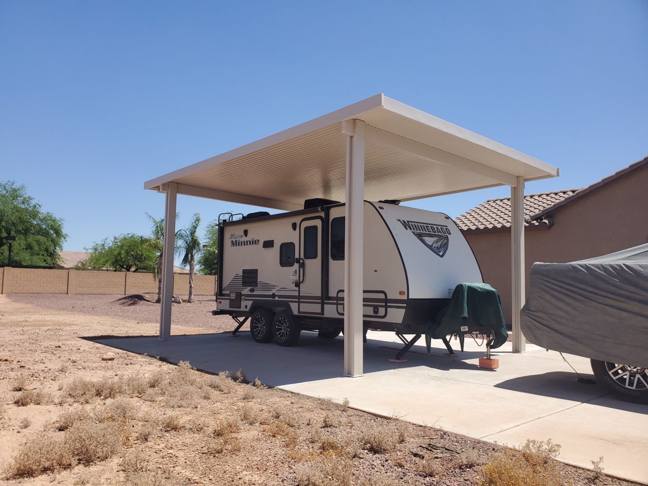 Peoria homeowners enjoy enhanced outdoor living with a durable Flat Pan Patio Cover from Southwest Patio.