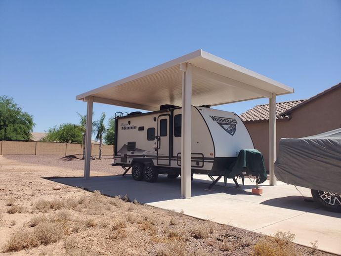 Families enjoying a shaded patio in Glendale, AZ, thanks to a durable Southwest Patio cover.