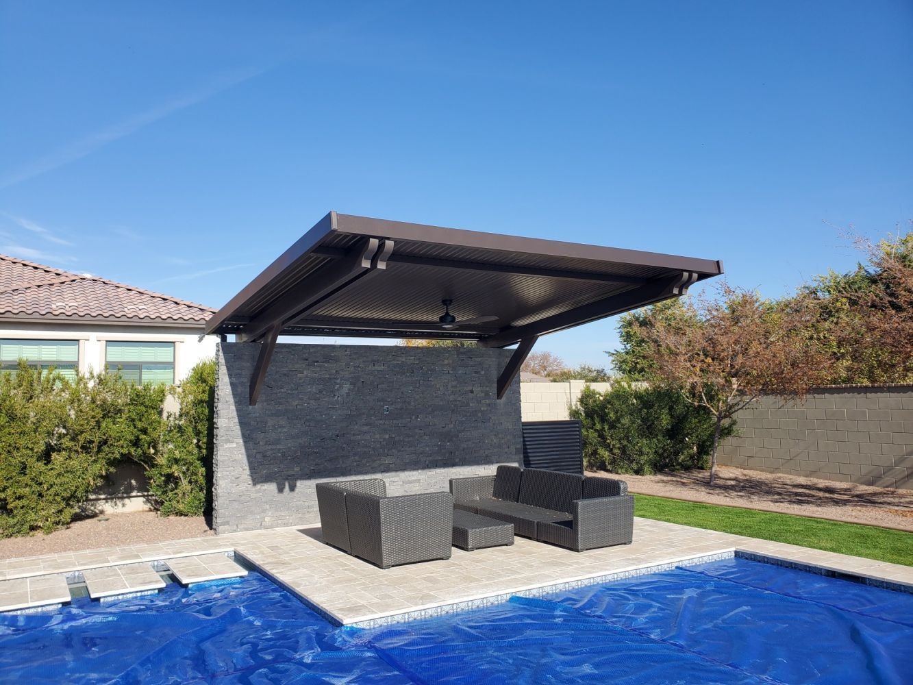 Elegant Solid Style Flat Pan Patio Cover enhancing outdoor living space in Phoenix, AZ.
