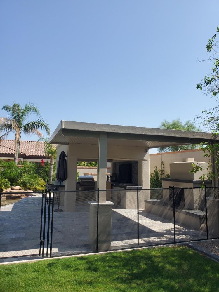 Wickenburg's rustic charm complemented by durable Flat Pan Patio Covers, ideal for desert living.