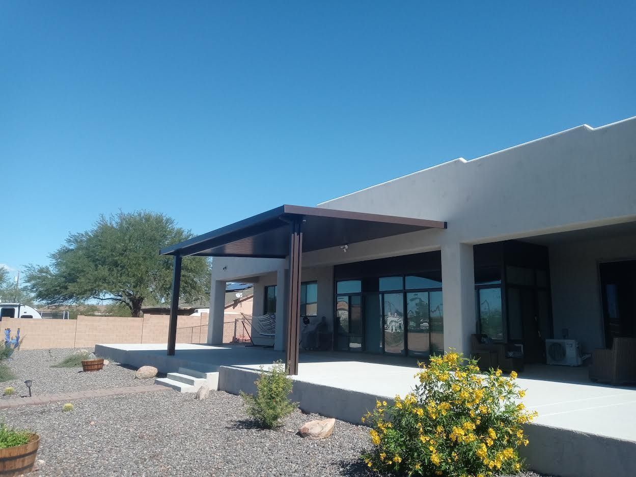 Avondale's outdoor aesthetics elevated with a Solid Style Flat Pan Patio Cover, merging durability with design.