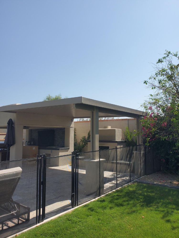 Tonopah's sprawling yards transformed with Solid Style Flat Pan Patio Covers, creating versatile outdoor rooms.