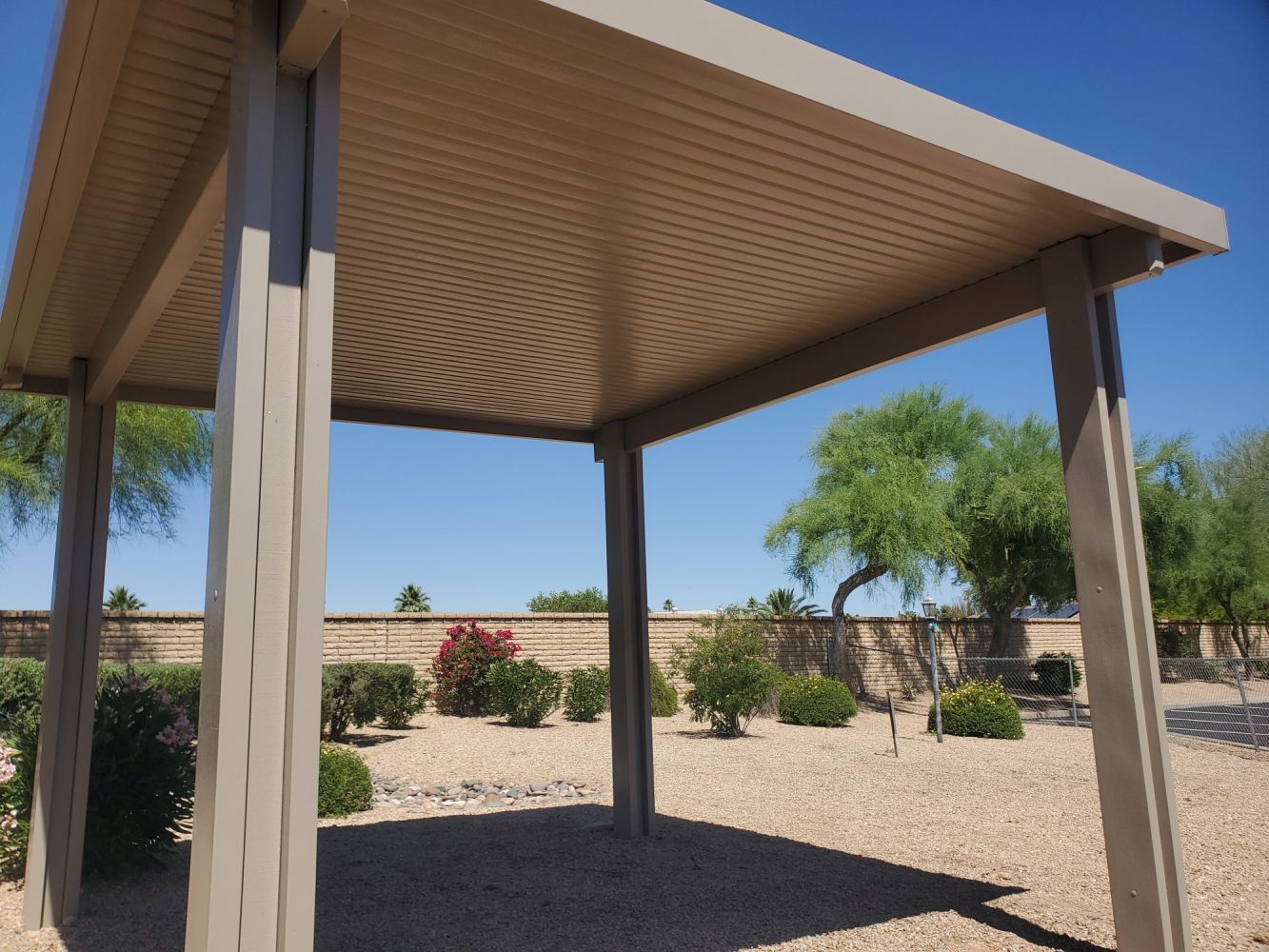 Custom-designed Flat Pan Patio Cover by Southwest Patio for year-round protection.
