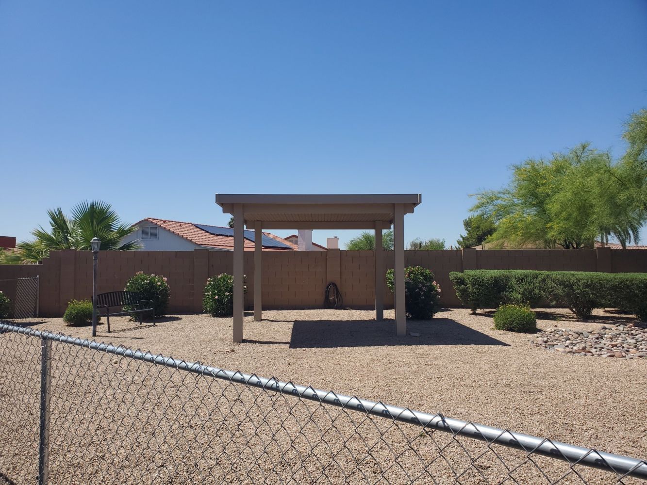 Maricopa's sunny patios cooled with Flat Pan Patio Covers, offering a respite from the heat.