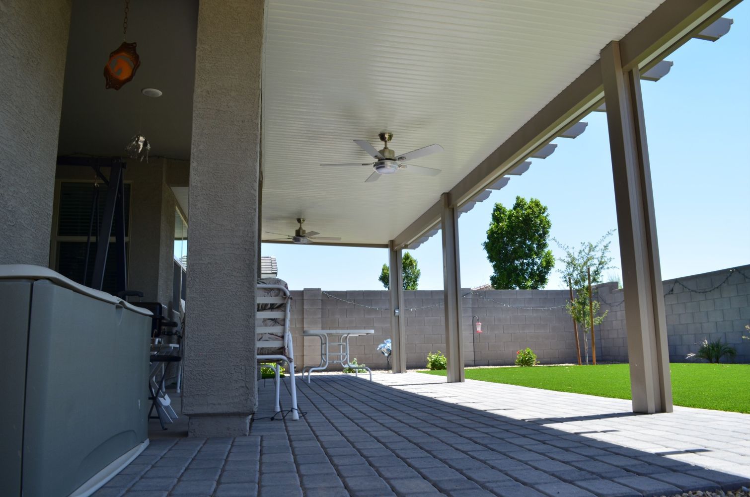 Durable Solid Style Flat Pan Patio Cover in Phoenix, enhancing outdoor living with year-round protection.