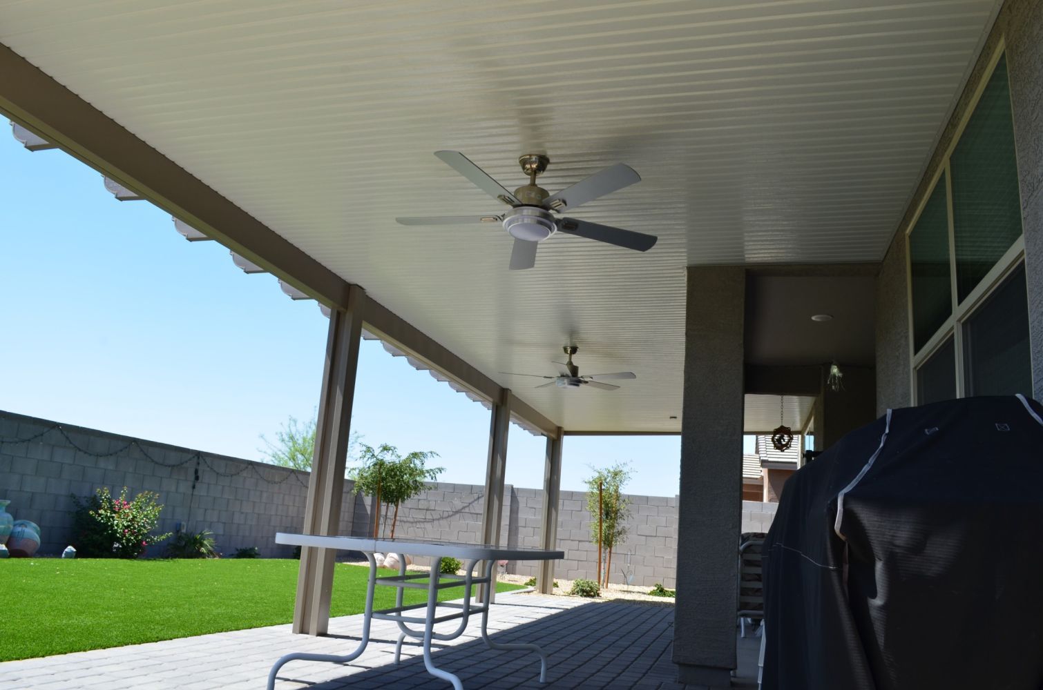 Queen Creek's outdoor lifestyles uplifted with Flat Pan Patio Covers, providing a sanctuary in the desert.