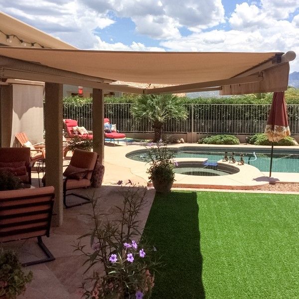 Classic gabled roof patio cover by Southwest Patio, adding architectural beauty to a Phoenix home.