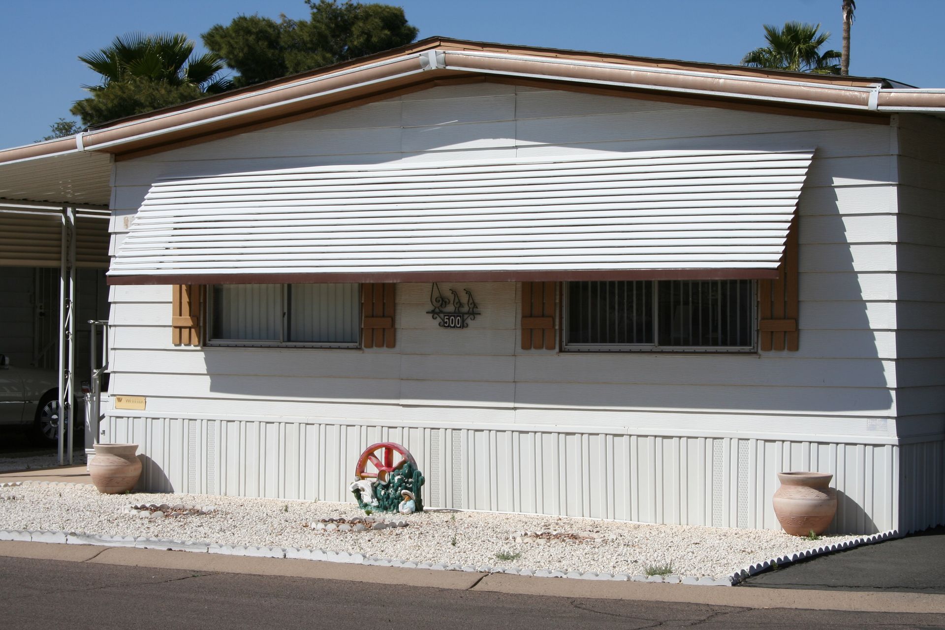 Elegant window awning design, offering functional beauty and UV protection in Tempe's sunny environment.