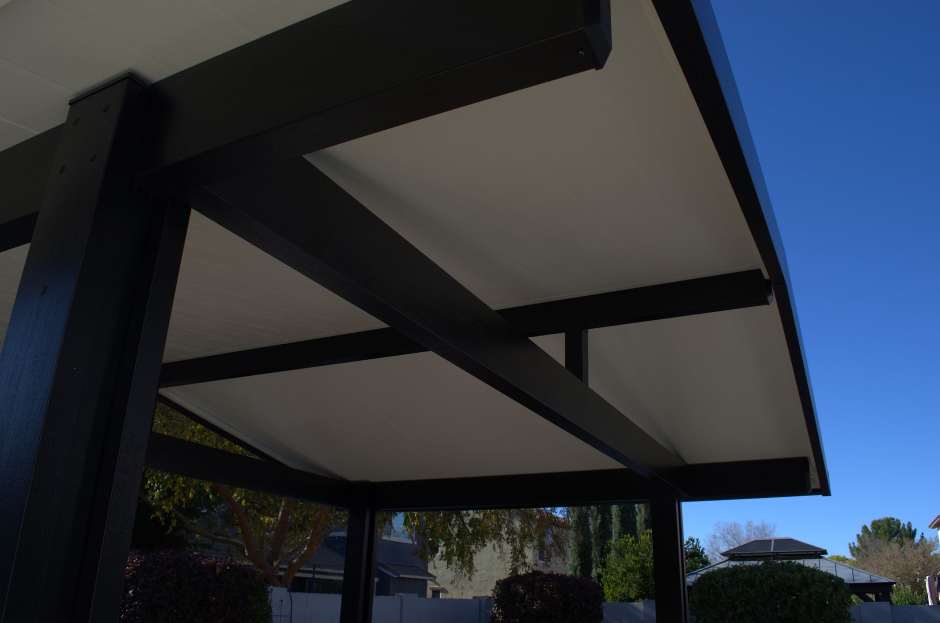 Durable and stylish Insulated Patio Cover, designed by Southwest Patio for year-round use.