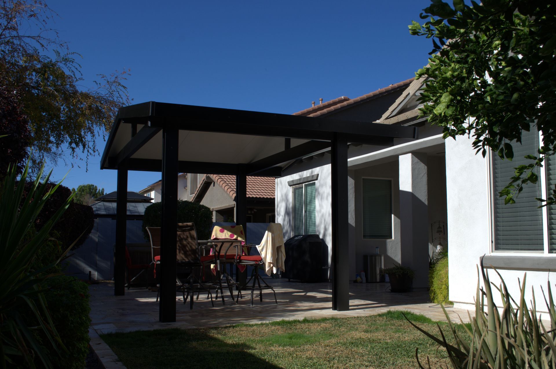 High-performance Solid Insulated Patio Cover for efficient sun blockage in Phoenix, AZ.