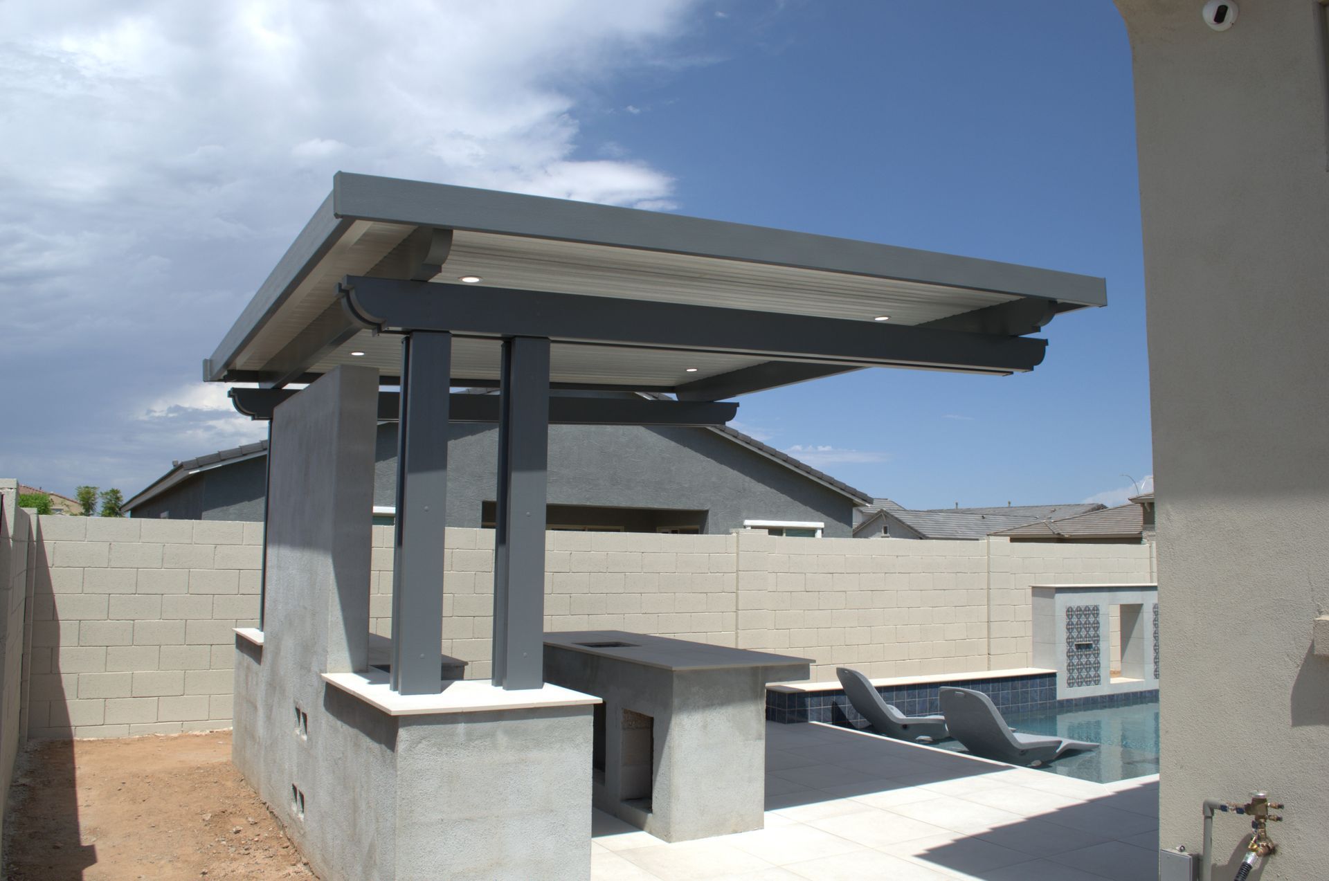Spacious and airy cantilever roof patio cover installed in Peoria, enhancing the home's outdoor appeal.