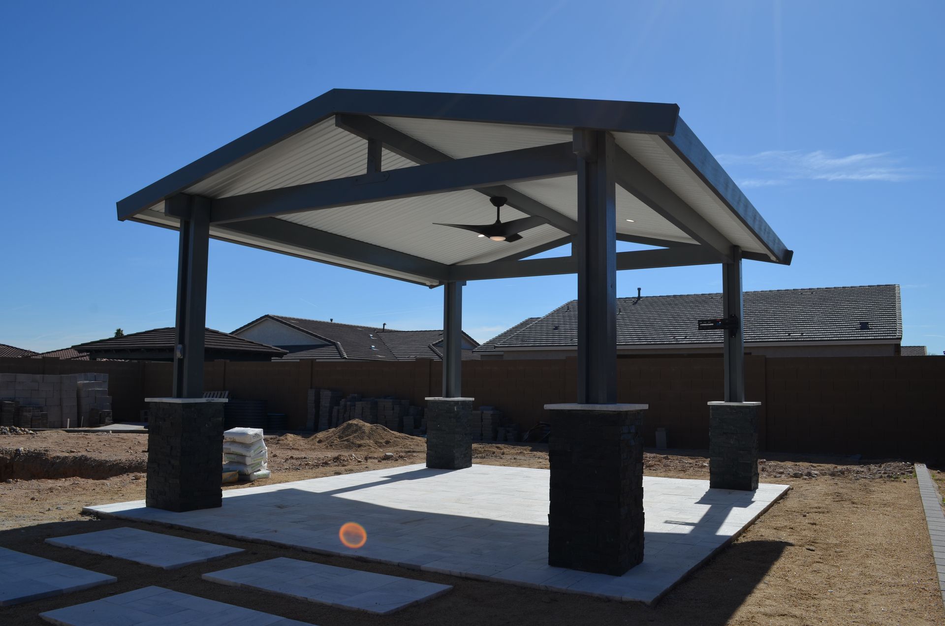 Innovative design of a gabled roof cover by Southwest Patio, offering year-round protection in Surprise, AZ.