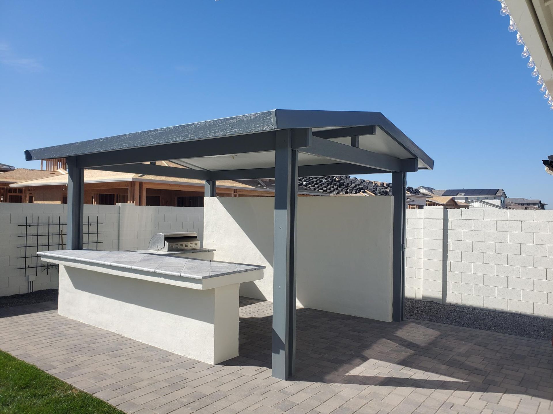 Elegant Gabled Roof design by Southwest Patio, perfectly complementing a Scottsdale residence.