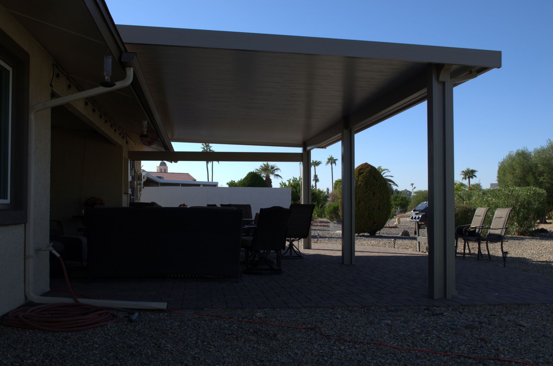custom patio shades from Southwest Patio, providing cool comfort to an Apache Junction outdoor area.