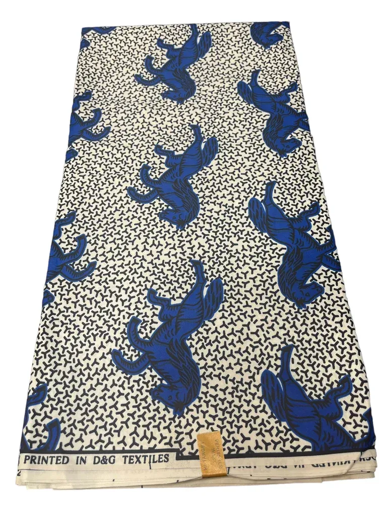Blue bird-patterned printed fabric on a cream background, shown full length with text along the bottom edge