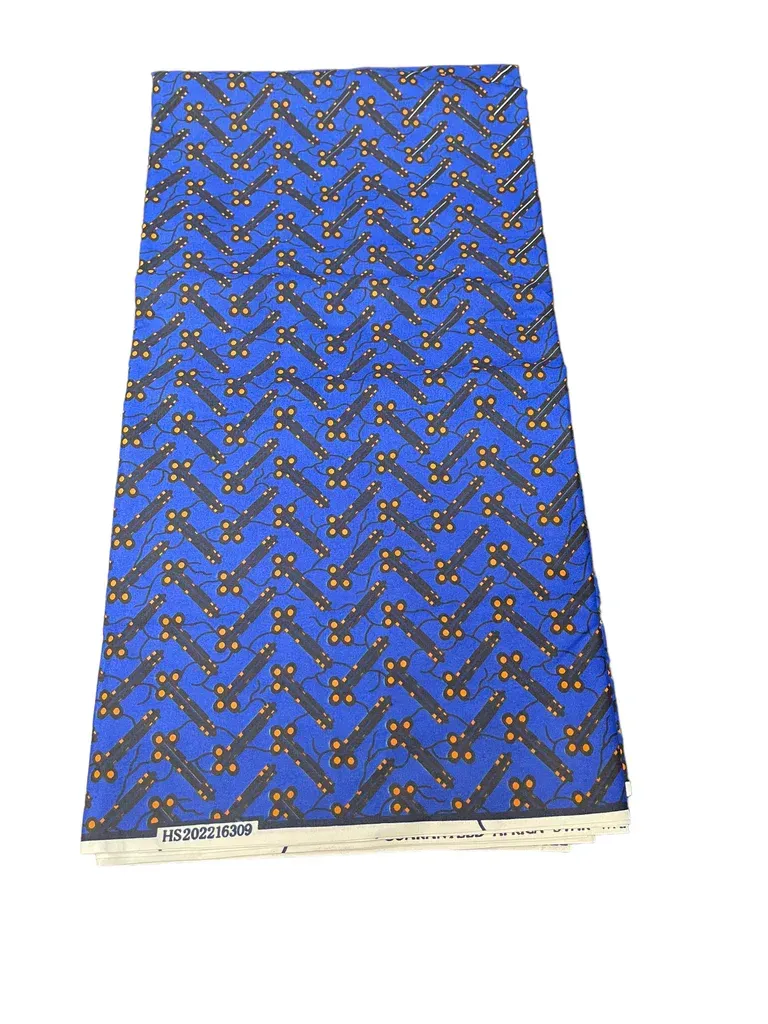 Blue patterned skirt with zigzag design and beige hem displayed on a white background
