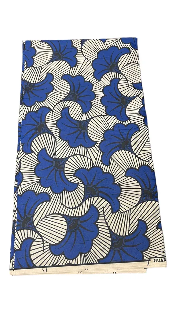 Blue and beige floral patterned fabric with a repeating abstract leaf design