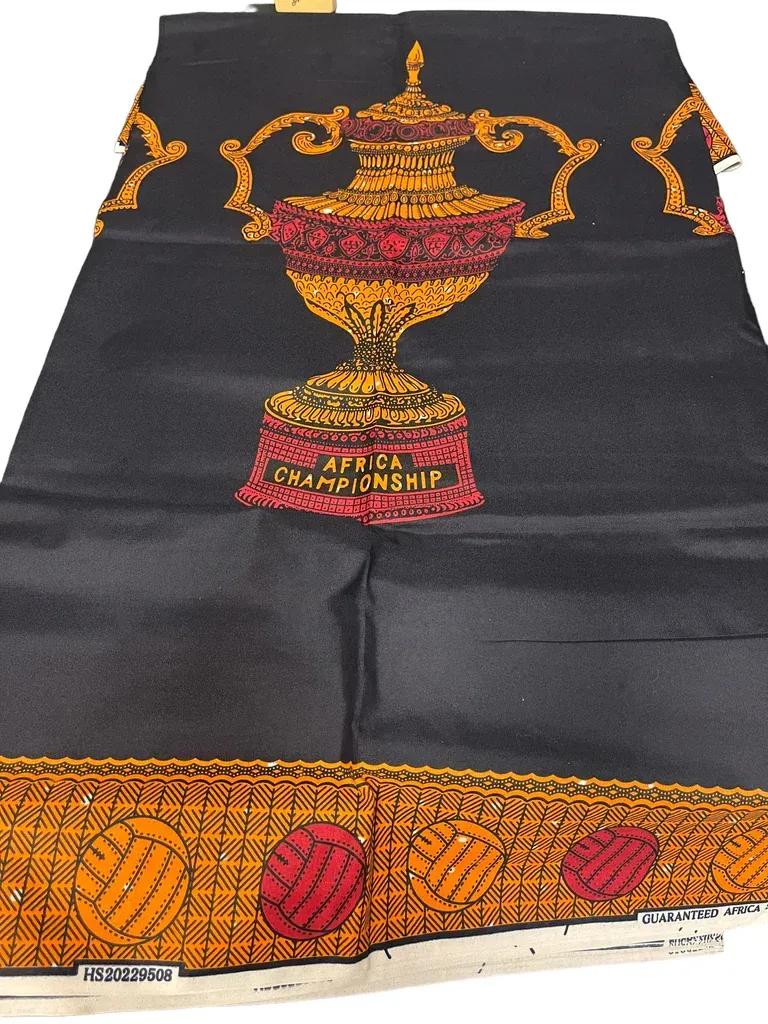 Black cloth with gold and red embroidered ceremonial urn and patterned border