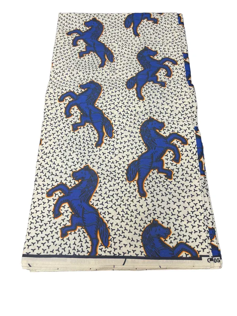 Patterned notebook with blue lizards on a white background