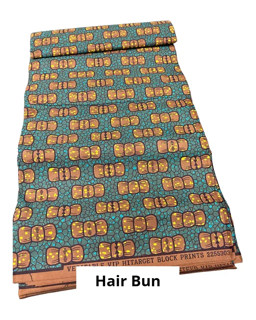 Hair bun with teal and orange patterned fabric, laid flat and labeled “Hair Bun.”