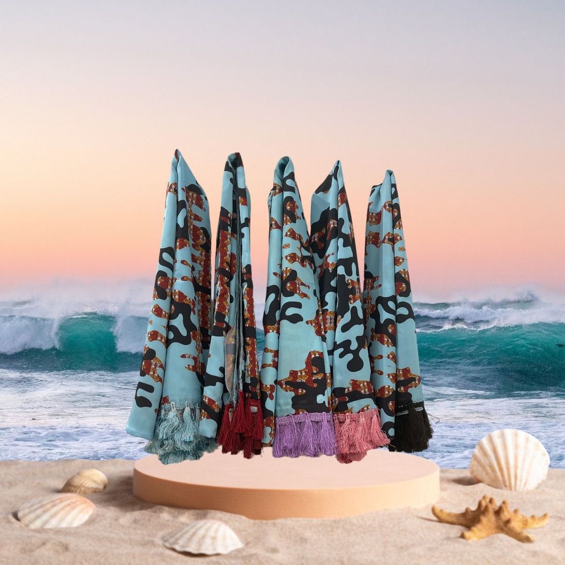 A bunch of towels are sitting on a podium on the beach