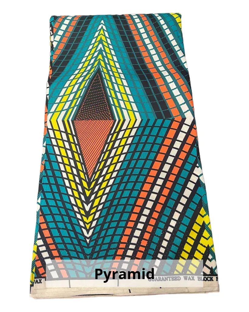 Colorful geometric textile with teal, orange, yellow, and white chevron pattern, labeled “Pyramida”
