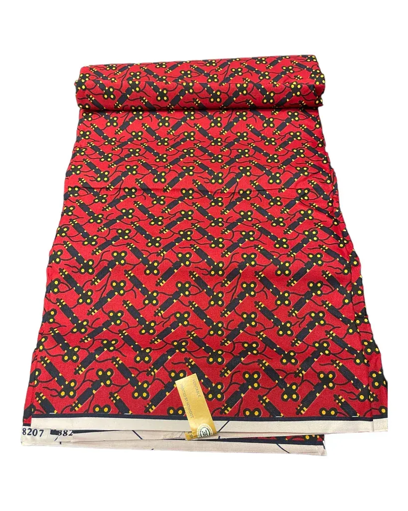 Red patterned pleated skirt with a folded waistband on a white background