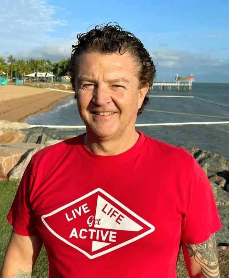 Man in Red Shirt — Skilful Living in North Ward, QLD