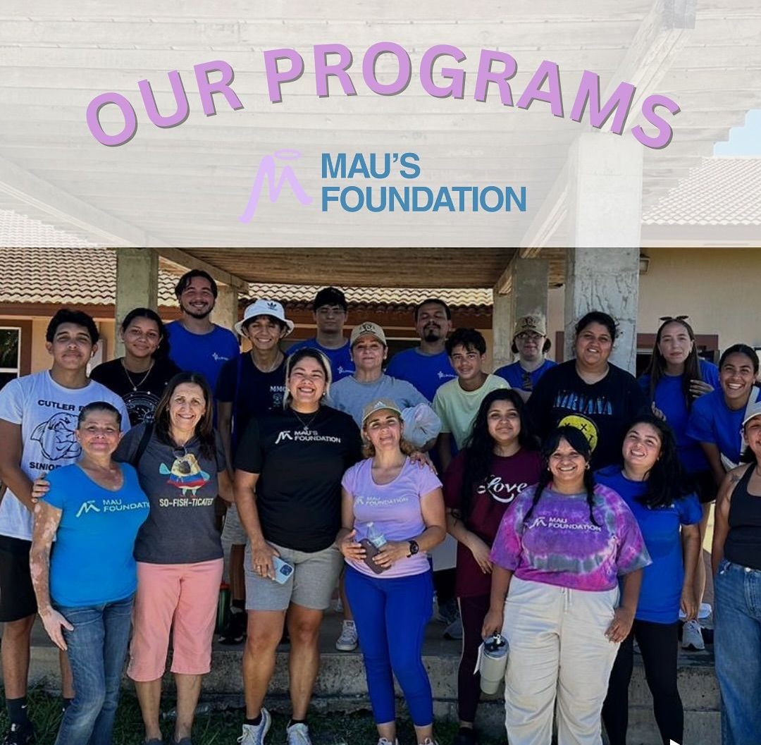 Group of people, likely volunteers, outside a building. Overhead text reads 