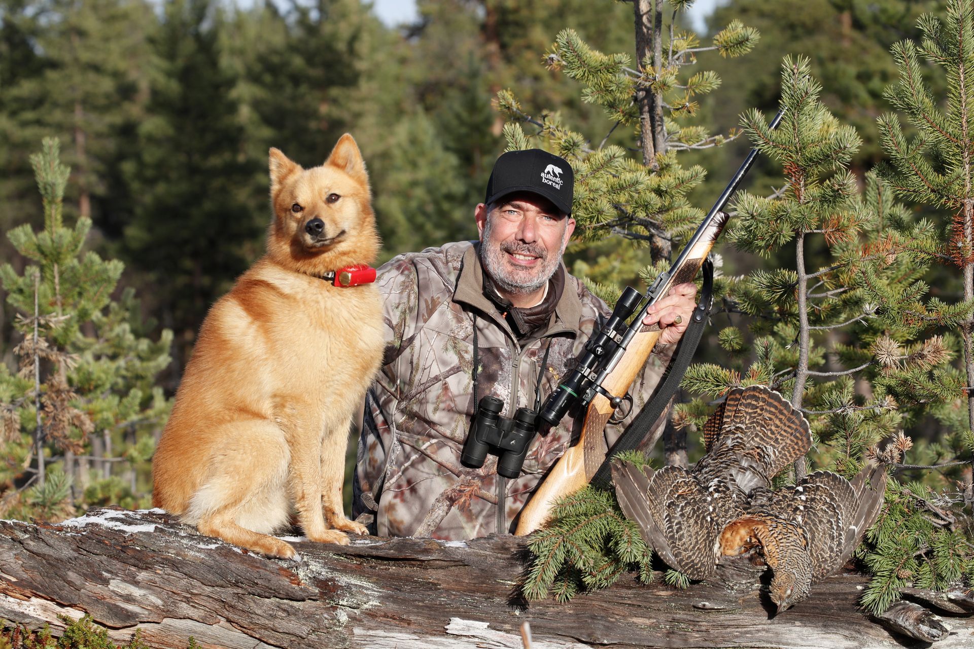 A hunter and their dog