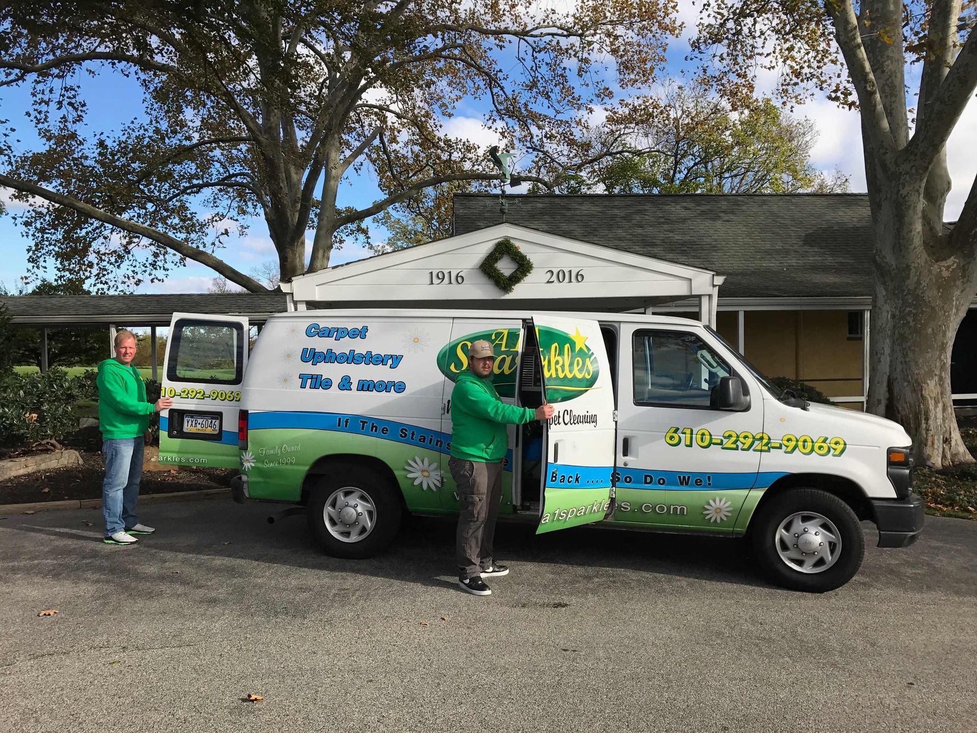 carpet cleaning van with two carpet cleaning technicians