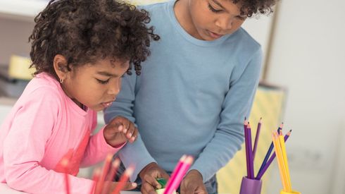 children expressing through creative drawing