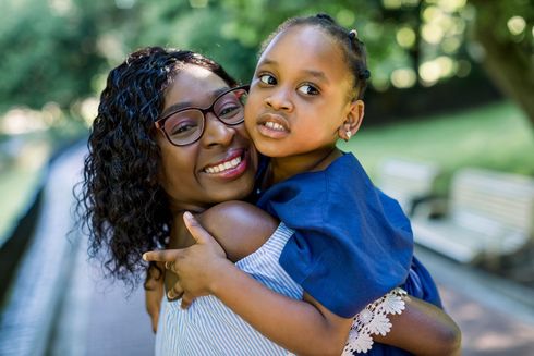 mother and daughter happy smiling
