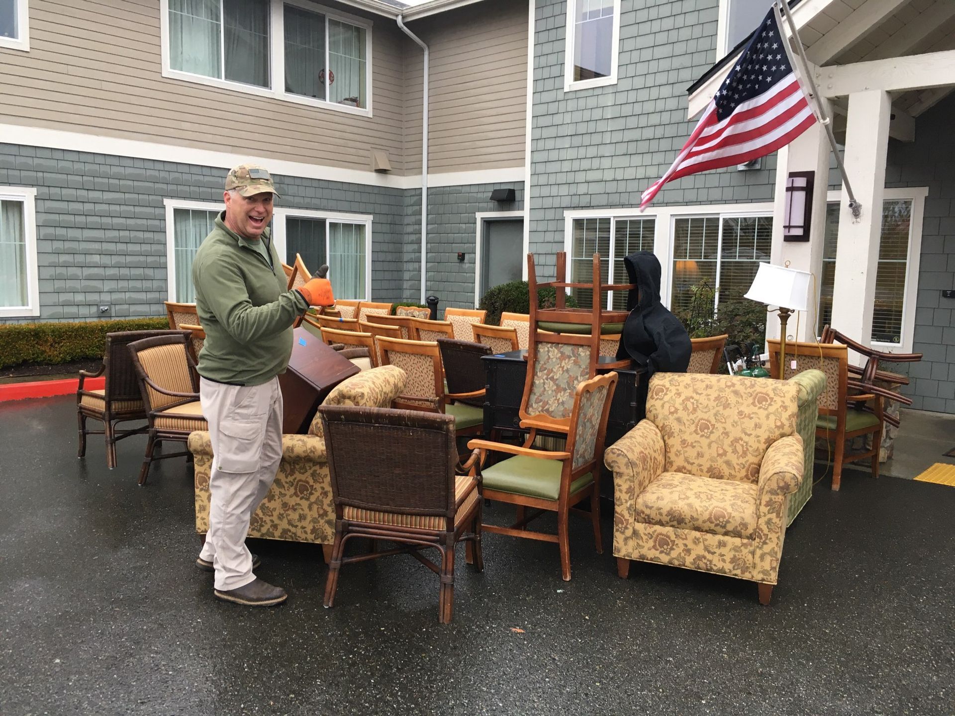 JDog team with donated furniture outside a Seattle shelter
