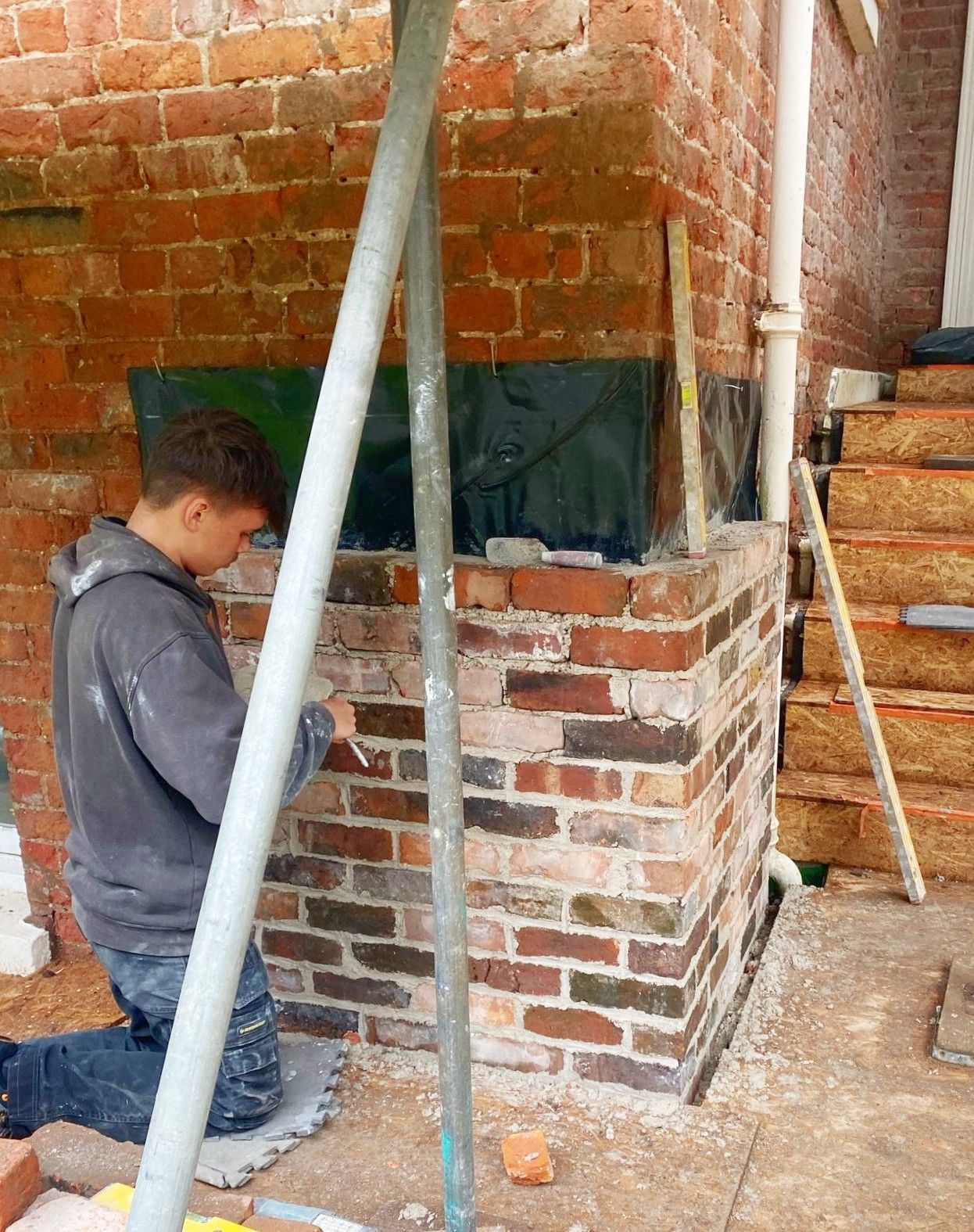 A mixer filled with lime mortar for building restoration