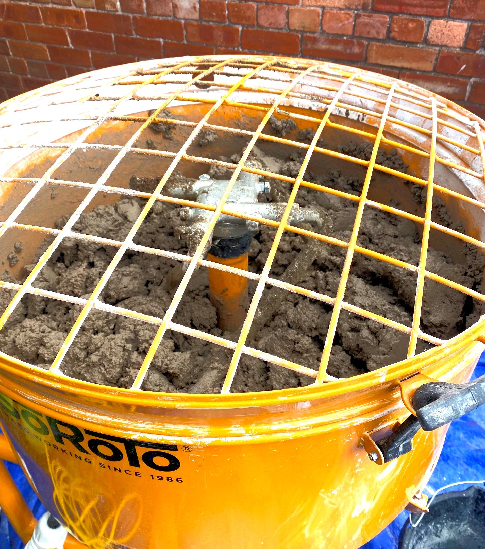 A mixer filled with lime mortar for building restoration