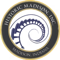 Historic Madison, Inc. logo with navy and gold circular spiral design, Madison, Indiana text